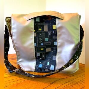 Pallas - mixed textile -messenger bag measurements @14x 14x4”. Strap adjustable